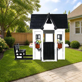 2MamaBees Oceano Playhouse styled in a sunny backyard, shown finish