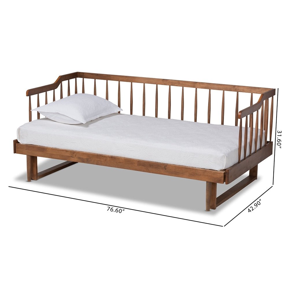 Wooden daybed with white mattress and pillows, shown with dimensions on a white background