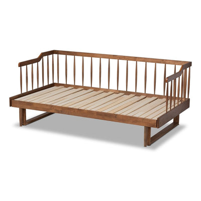 Wooden daybed with slatted bed platform on a white background