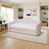 Baxton Studio Perry Modern and Contemporary Light Pink Velvet Fabric Upholstered and Button Tufted Twin Size Daybed with Trundle styled in a bright kids' bedroom, Pink