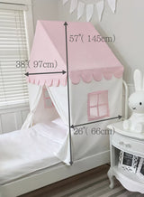 Pink children's canopy bed with measurements in a bedroom setting.