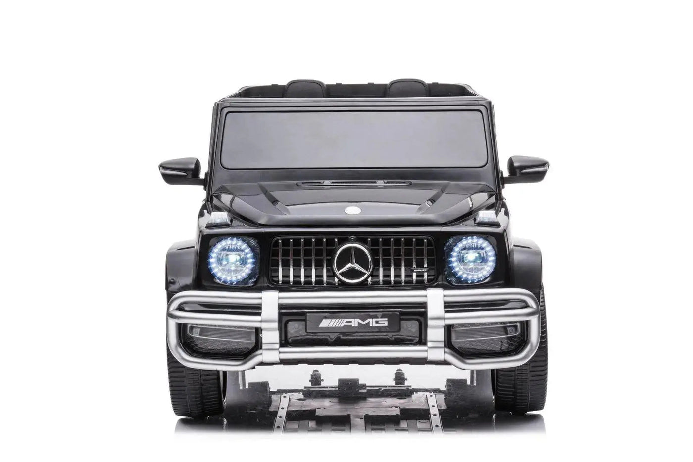 24V black Mercedes Benz G63 AMG 4x4 ride-on car for kids, featuring a realistic luxury SUV design, two seats, LED lights, working doors, and all-terrain wheels.