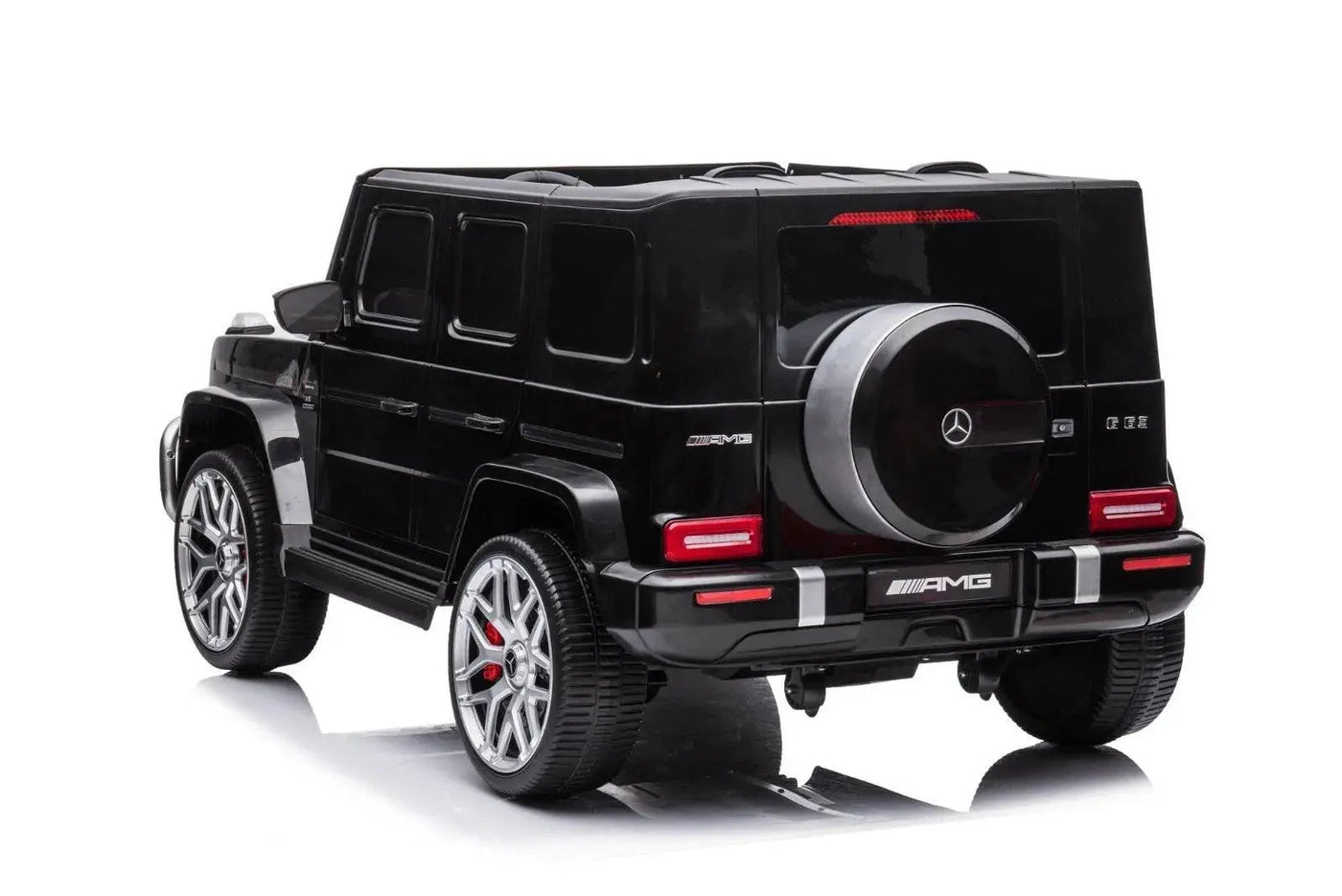 24V black Mercedes Benz G63 AMG 4x4 ride-on car for kids, featuring a realistic luxury SUV design, two seats, LED lights, working doors, and all-terrain wheels.