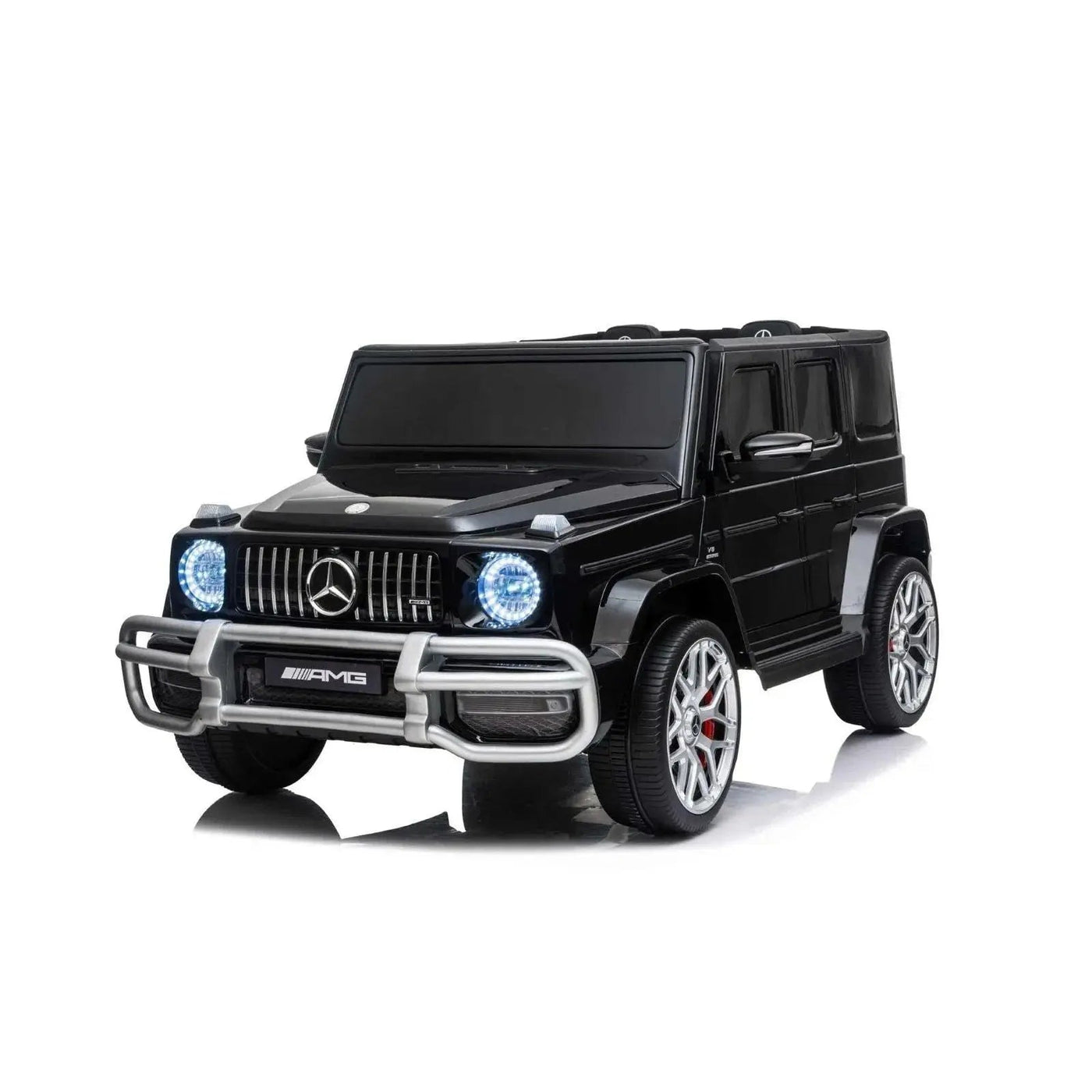 24V black Mercedes Benz G63 AMG 4x4 ride-on car for kids, featuring a realistic luxury SUV design, two seats, LED lights, working doors, and all-terrain wheels.