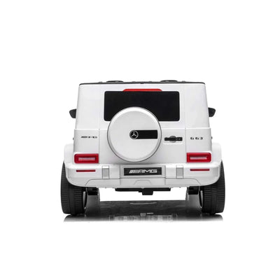 24V white Mercedes Benz G63 AMG 4x4 ride-on car for kids, featuring a realistic luxury SUV design, two seats, LED lights, working doors, and all-terrain wheels.