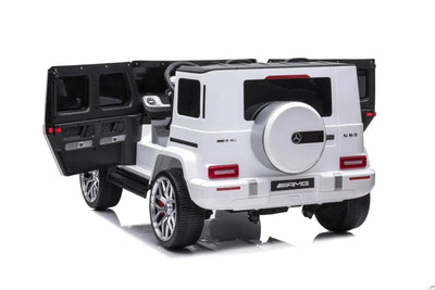 24V white Mercedes Benz G63 AMG 4x4 ride-on car for kids, featuring a realistic luxury SUV design, two seats, LED lights, working doors, and all-terrain wheels.