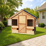 Playhouse Factory Little Alexandra Cottage (4 ft x 6 ft) styled in a sunny backyard, shown finish