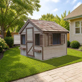 Playhouse Factory Little Alexandra Cottage (6ft x 6ft) styled in a sunny backyard, shown finish