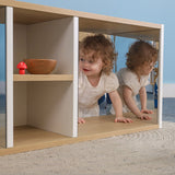 Whitney Brothers elevatED Discovery Crawl Thru Cabinet Toddler Discovery Cabinet - close-up toddler crawl-through mirror play scene