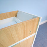 Whitney Brothers elevatED Infant Changing Cabinet Classroom Changing Cabinet - side view showing brushed nickel legs