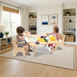 Whitney Brothers® Toddler Flower Classroom Table and Two Chair Set For Preschool styled in a bright kids' bedroom, desk