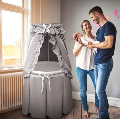 Gray Empress Round Baby Bassinet with Canopy – Elegant and cozy bassinet with a charming canopy for a dreamy nursery – MonkeyBunks.com.