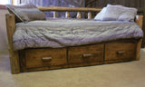 Rustic cedar log day bed with wooden frame and natural finish
