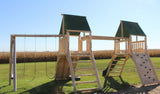 Cedar log playset with monkey bars, swings, slide, and rustic double tower design for kids.