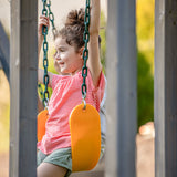 Jack & June Haven II wooden swing set with slide, rock wall, and two belt swings for backyard outdoor play
