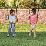 Jack & June Haven II wooden swing set with slide, rock wall, and two belt swings for backyard outdoor play