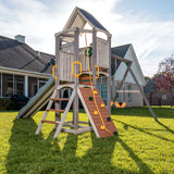 Jack & June Haven II wooden swing set with slide, rock wall, and two belt swings for backyard outdoor play