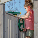 Jack & June Haven II wooden swing set with slide, rock wall, and two belt swings for backyard outdoor play