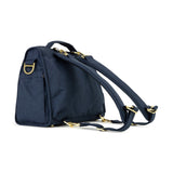 Jujube B.F.F. diaper bag in Indigo Chromatics color, featuring a sleek convertible design with multiple compartments and modern styling for parents on the go.