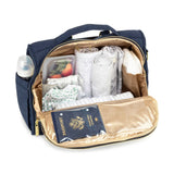 Jujube B.F.F. diaper bag in Indigo Chromatics color, featuring a sleek convertible design with multiple compartments and modern styling for parents on the go.
