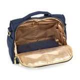 Jujube B.F.F. diaper bag in Indigo Chromatics color, featuring a sleek convertible design with multiple compartments and modern styling for parents on the go.