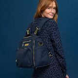 Jujube B.F.F. diaper bag in Indigo Chromatics color, featuring a sleek convertible design with multiple compartments and modern styling for parents on the go.