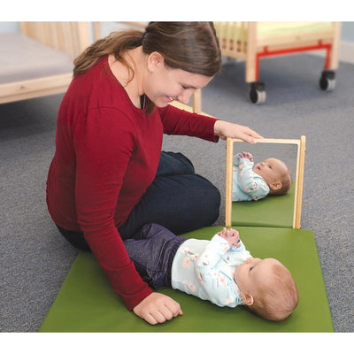 Whitney Brothers Infant Mirror Stand for babies and toddlers, wooden frame with shatterproof mirror for early development and sensory exploration.